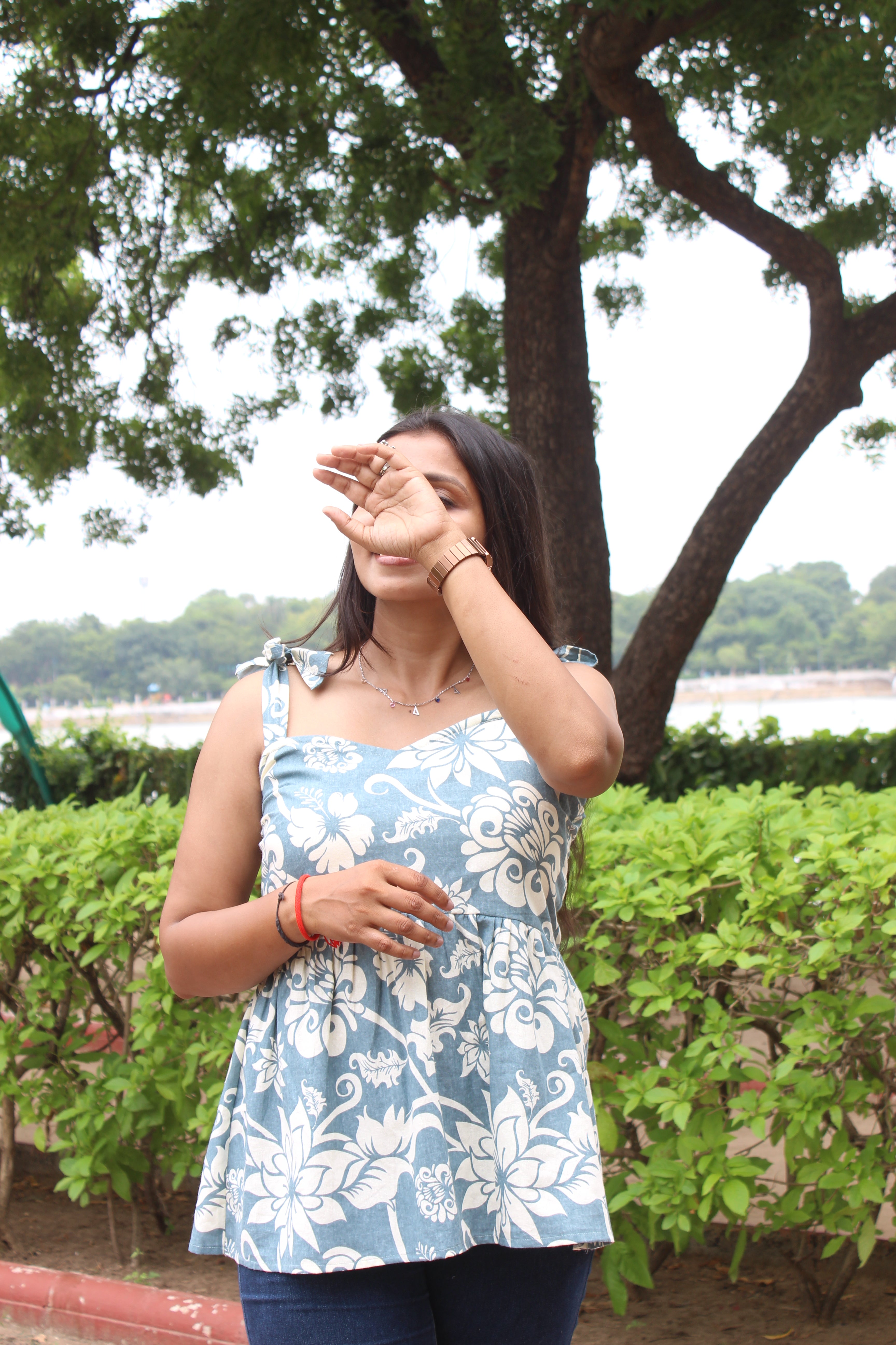 Skydori Floral Printed Sleeveless Peplum Top